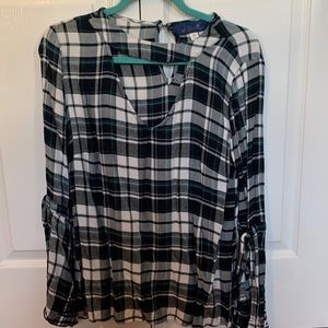 Plaid top with bell embroidered sleeves from Francesca’s